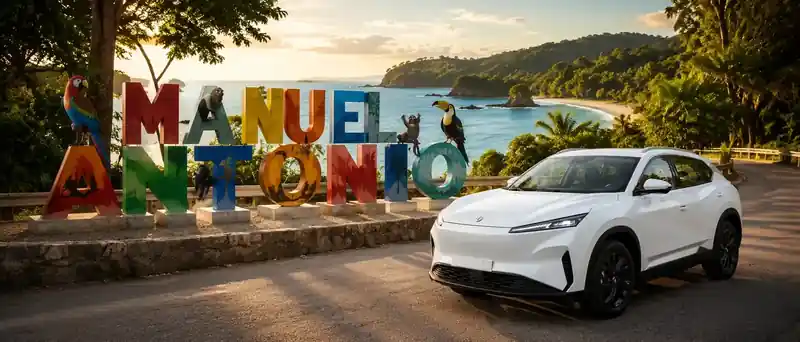 White private transfer SUV near a tropical beach representing La Fortuna to Manuel Antonio transfer